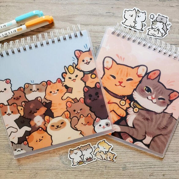 Picture of two cat-themed sticker books.