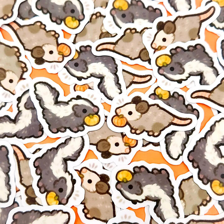 Picture of a variety of small, colorful animal stickers.