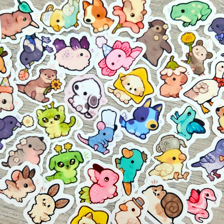 Picture of a variety of small, colorful animal stickers.